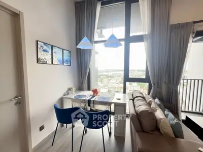 Modern living room with large windows and city view, featuring stylish dining area and cozy seating.