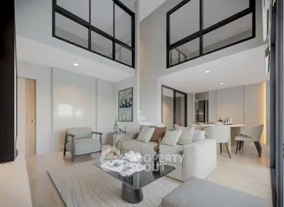 Modern open-plan living room with stylish furniture and large windows