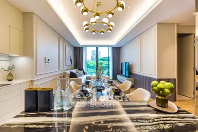 Luxurious open-plan living room with elegant dining area and modern decor, featuring a stunning view.