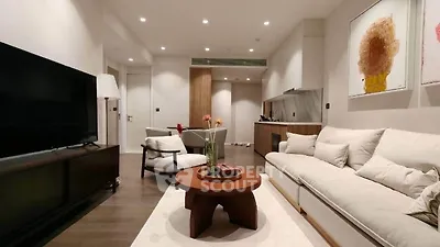 Modern living room with elegant decor and cozy seating area