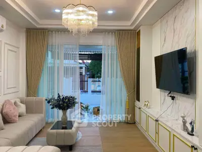 Elegant living room with modern decor and large window view
