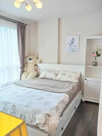 Cozy bedroom with plush teddy bear and elegant decor