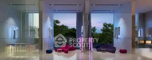 Luxurious modern lobby with sleek design and vibrant seating, offering a stunning view of the outdoors.