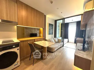 Modern open-plan living room with integrated kitchen and stylish decor
