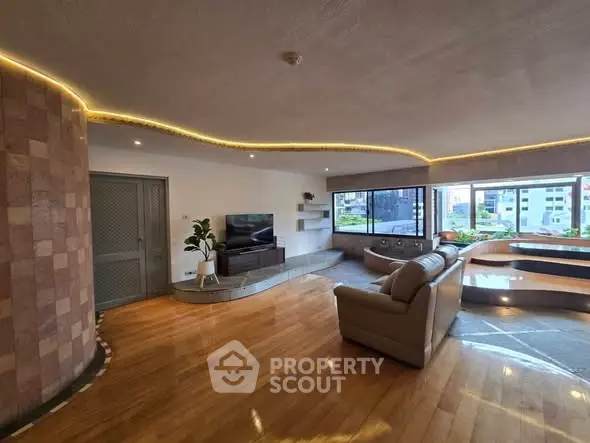 Spacious living room with modern design and city view