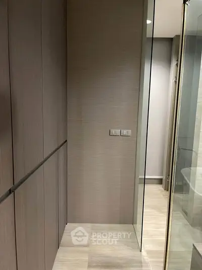 Modern bathroom with sleek glass shower and minimalist design