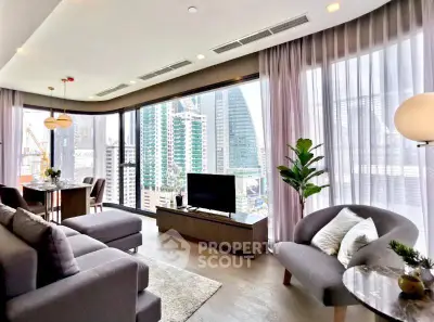Luxurious modern living room with stunning city view and elegant furnishings.