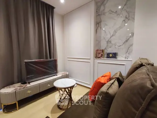 Cozy living room with modern decor and marble accents