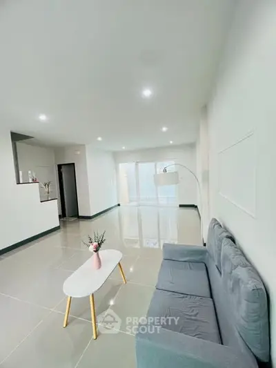 Spacious modern living room with sleek design and elegant decor