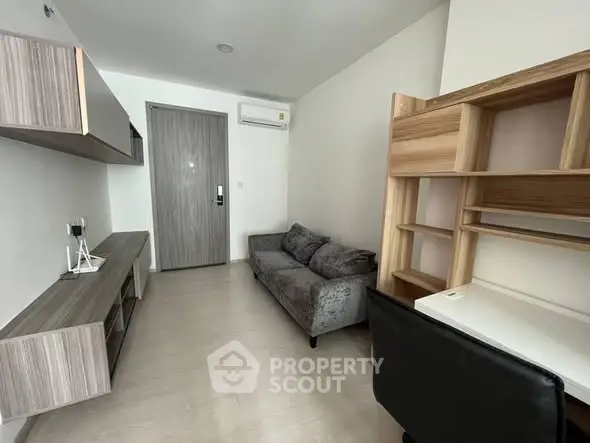 Modern living room with sleek furniture and neutral tones, perfect for urban living.