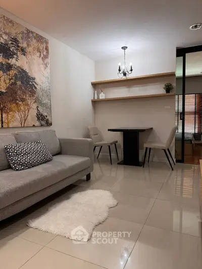 Modern living room with elegant decor and cozy seating area