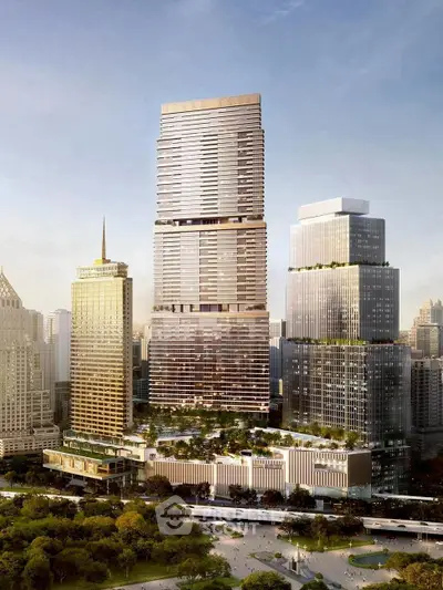 Stunning high-rise building with modern architecture and lush green surroundings.