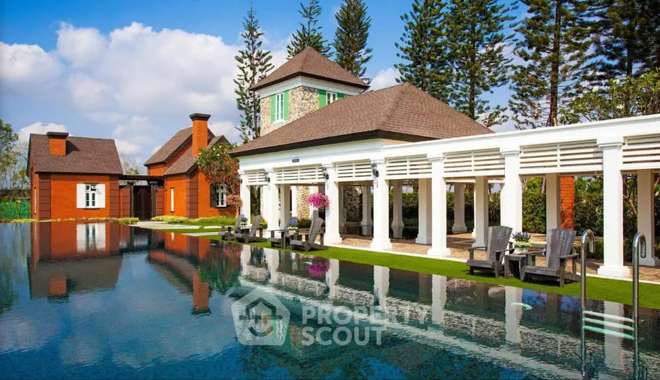Luxurious villa with stunning pool and lush garden, perfect for serene living.