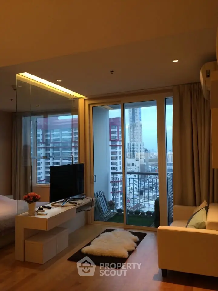 Modern living room with balcony and city view in high-rise apartment