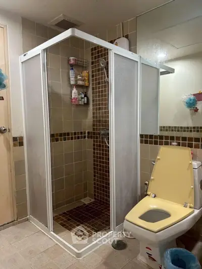 Modern bathroom with sleek fixtures and contemporary design.