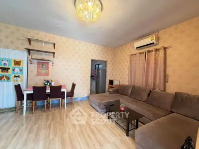 Spacious living room with modern decor and cozy seating area
