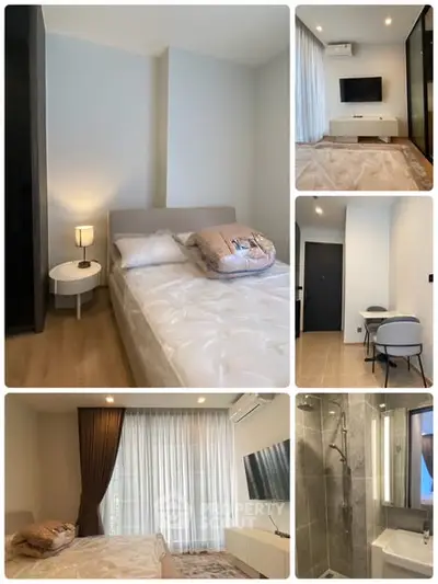 Modern bedroom with stylish decor and ensuite bathroom in a contemporary apartment.