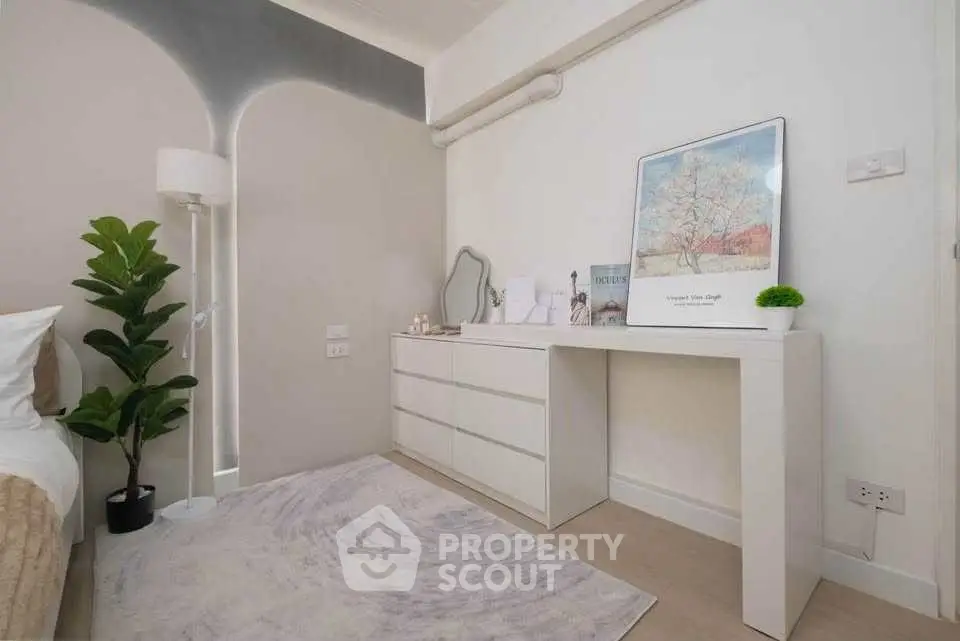 Modern bedroom with stylish decor and minimalist furniture