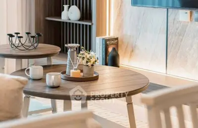 Stylish living room with modern decor and elegant coffee table setup.