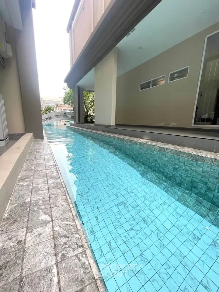 Luxurious residential pool with modern design and serene ambiance