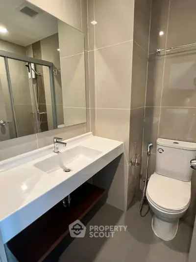 Modern bathroom with sleek fixtures and spacious design