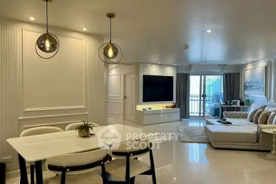 Luxurious open-plan living room with elegant dining area and modern decor