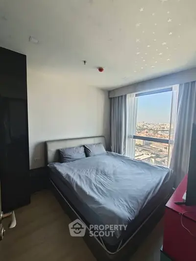 Modern bedroom with city view and stylish decor