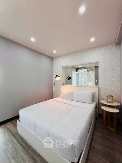 Modern bedroom with stylish decor and cozy ambiance