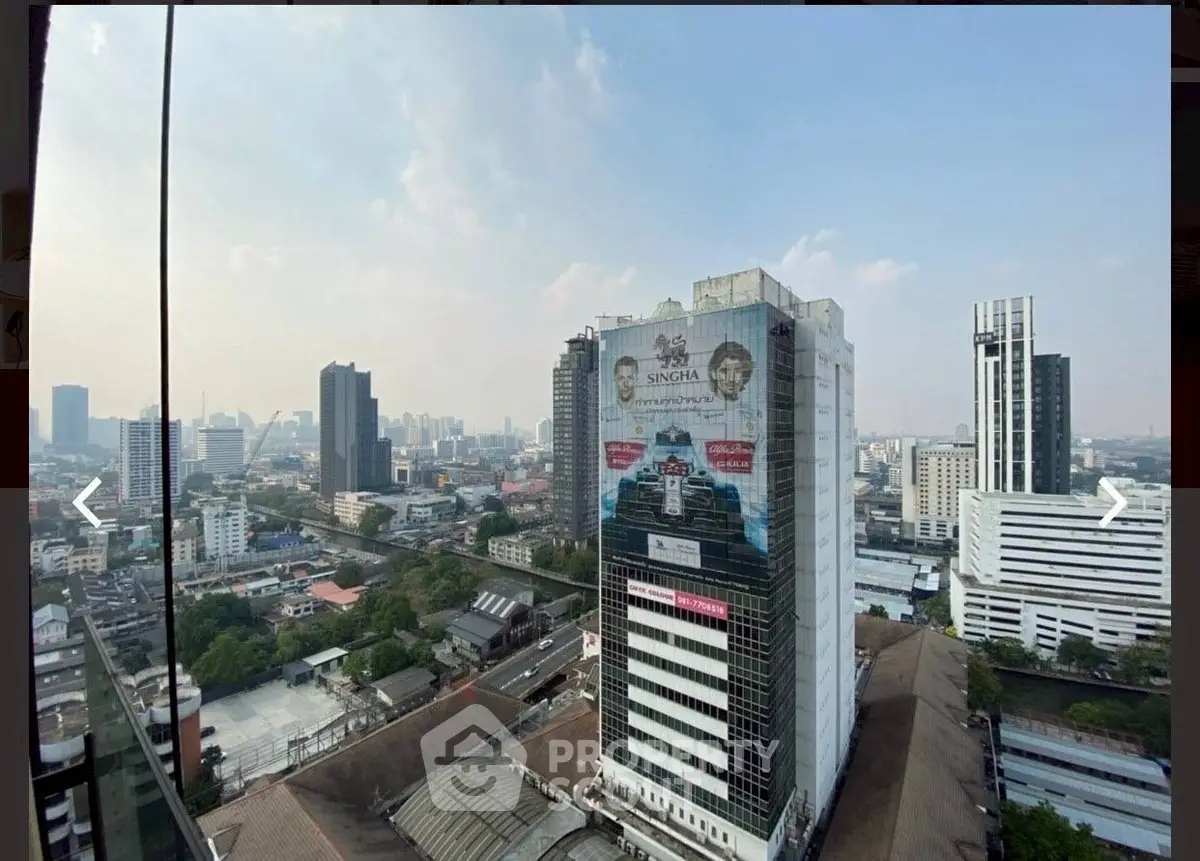 Stunning cityscape view from high-rise building showcasing urban skyline and architectural diversity.