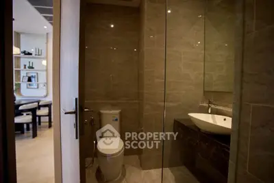 Modern bathroom with sleek design and glass shower enclosure