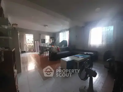 Spacious living room with cozy seating and natural light