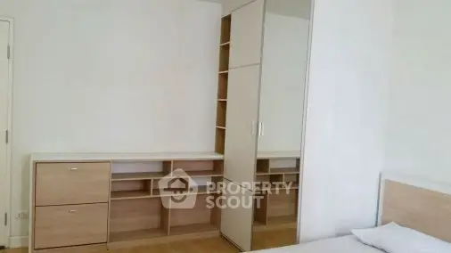 Modern bedroom with built-in wardrobe and minimalist design