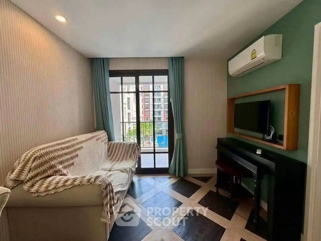 Modern living room with stylish flooring and large window offering city view