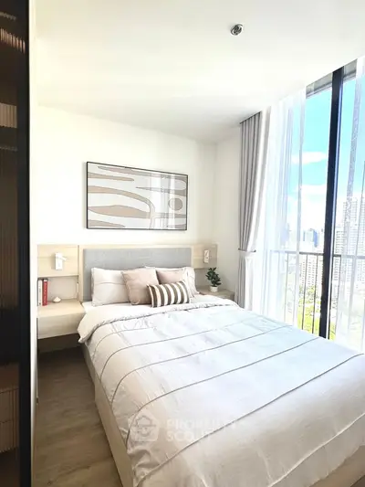 Bright and modern bedroom with city view and stylish decor