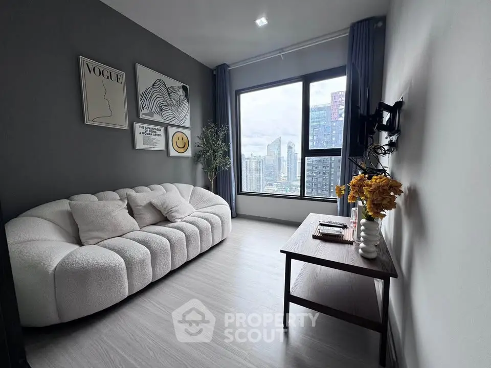 Modern living room with stylish decor and city view from large window