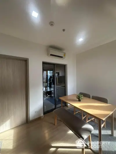 Modern dining area with natural light and minimalist design