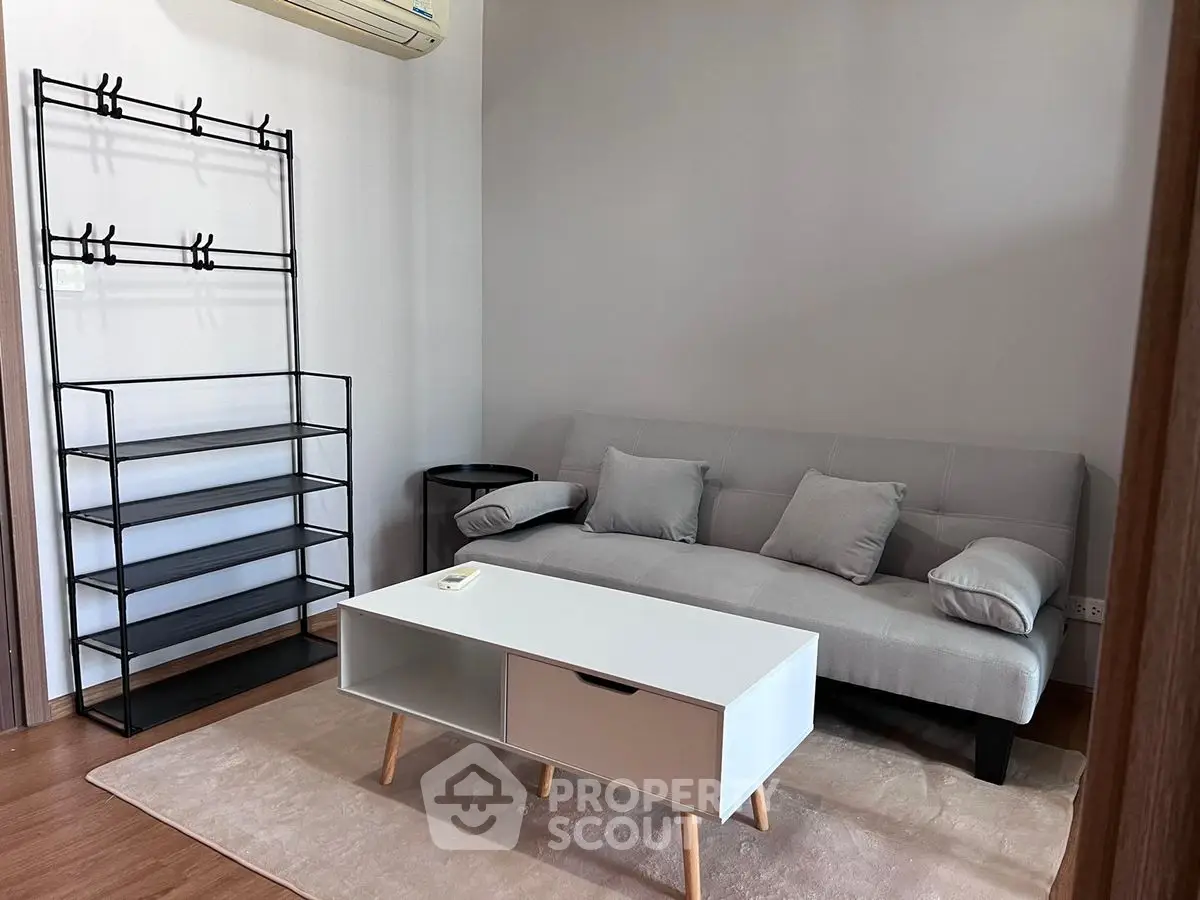 Modern living room with sleek furniture and minimalist design