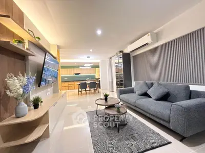 Modern living room with sleek design, open layout, and stylish furniture, perfect for contemporary living.