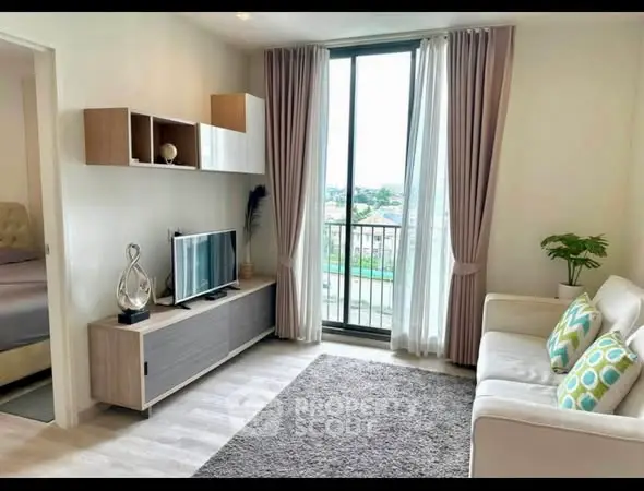 Modern living room with large window and stylish decor