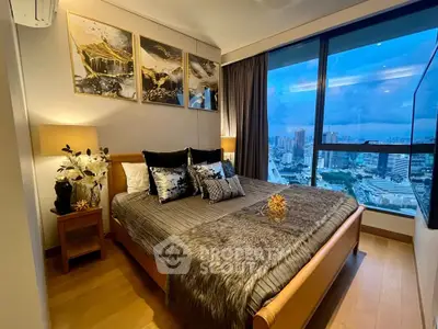 Luxurious bedroom with stunning city view and elegant decor