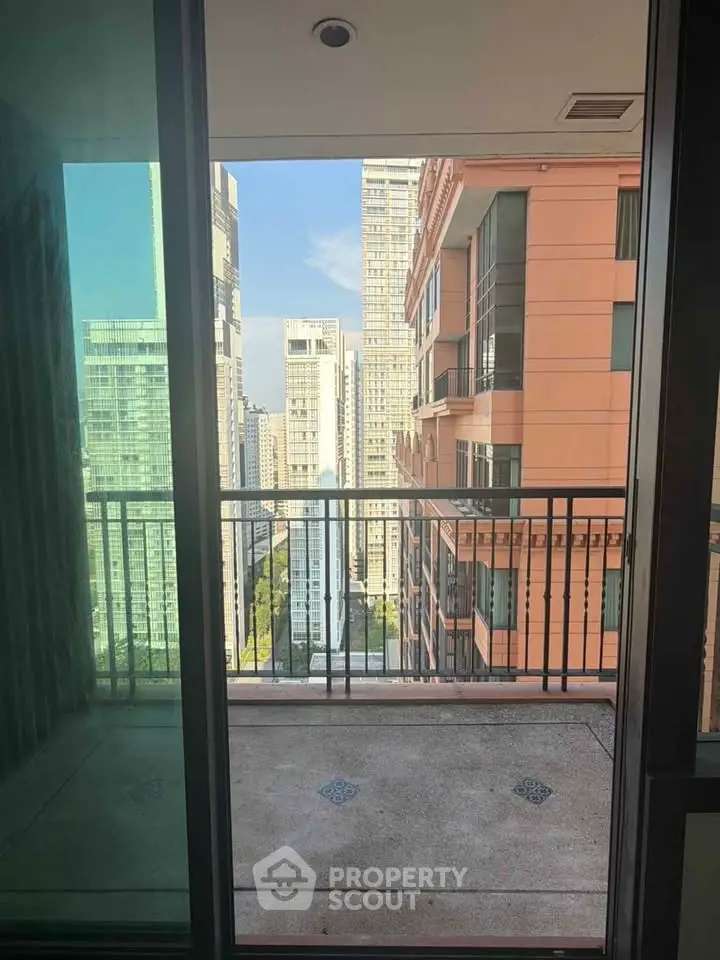 Stunning cityscape view from a high-rise balcony, perfect for urban living enthusiasts.