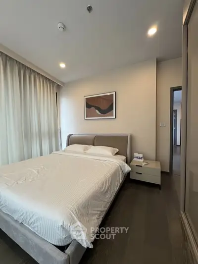 Modern bedroom with stylish decor and cozy ambiance