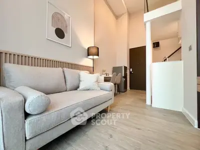 Modern living room with stylish decor and cozy seating area