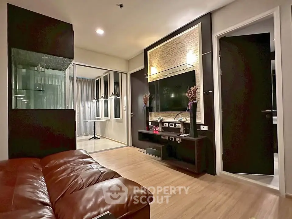 Modern living room with sleek design and cozy leather sofa