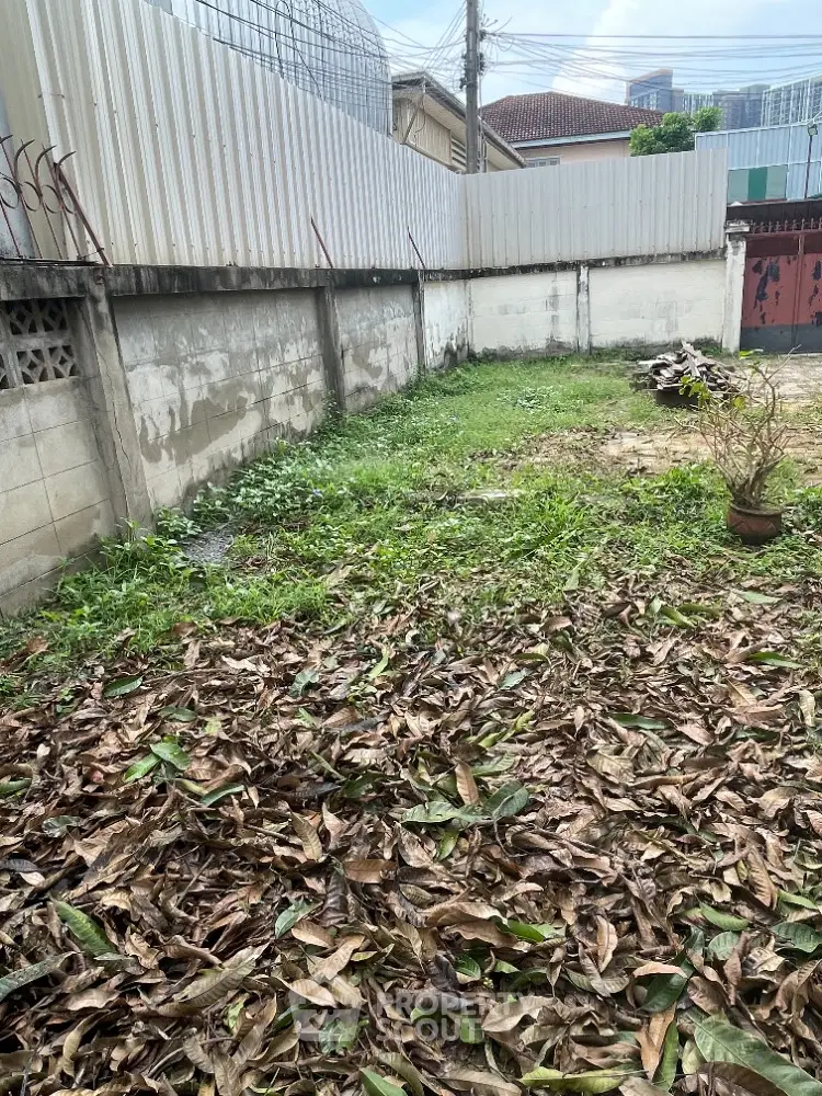Spacious backyard with potential for landscaping in urban residential area