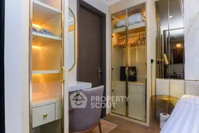 Luxurious bedroom with elegant wardrobe and vanity area, perfect for modern living.