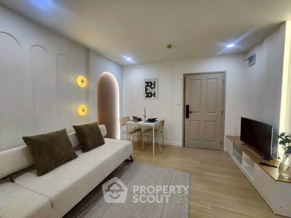 Modern living room with stylish decor and cozy dining area