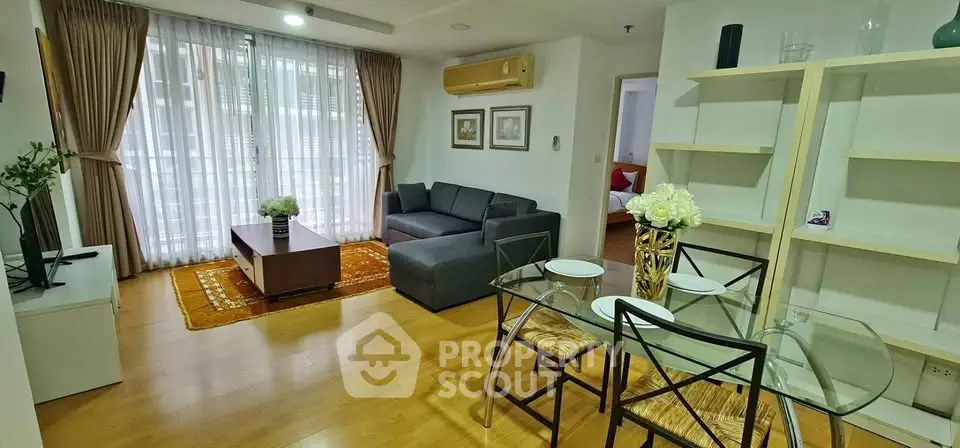 Spacious living room with modern decor and natural light