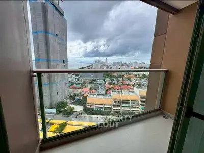 Stunning cityscape view from modern high-rise balcony, perfect for urban living.