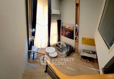 Spacious modern living room with high ceilings and stylish decor